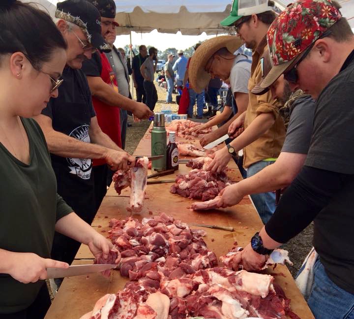 Group cuts meat. PC: John Bowden