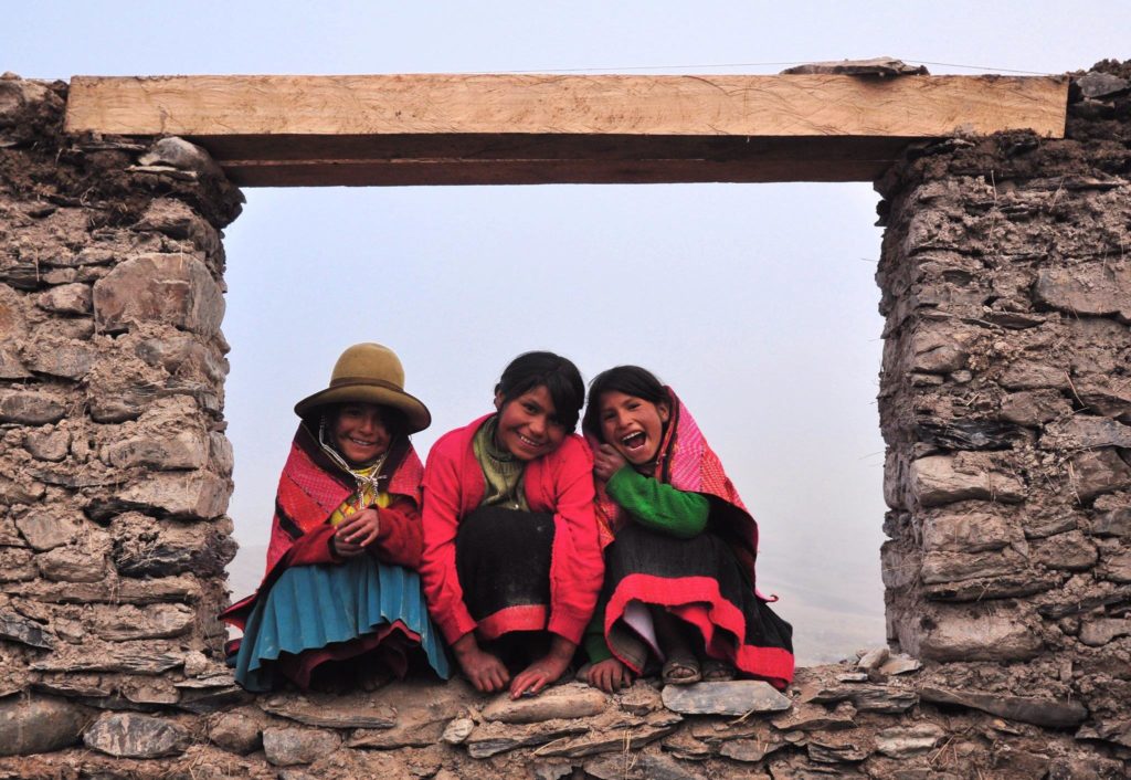 Three girls of Q'eros, an area of Peru still practicing Ayni, the Andean word for reciprocity. PC: Hannah Rae